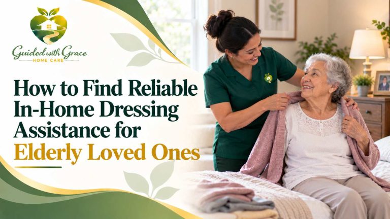 Caregiver helping a seated elderly woman button her cardigan in a bright bedroom